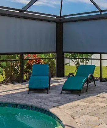 two chairs on patio lanai with outdoor screen proctors