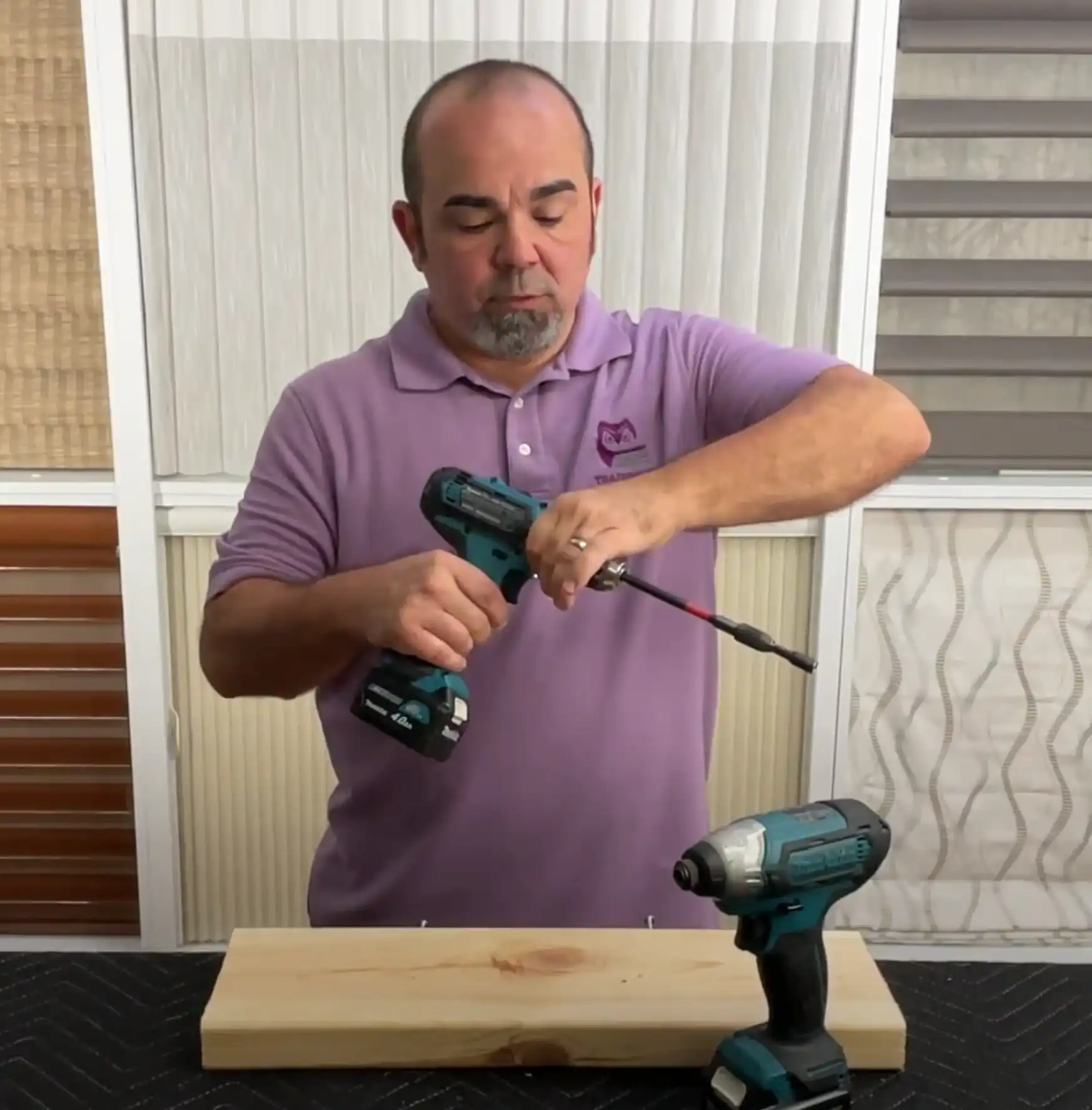 roger-magalhaes-installing-training Roger Magalhaes, with drill