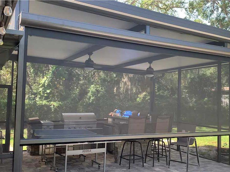 patio-pool-remote-screens Retractable screen over grillside patio