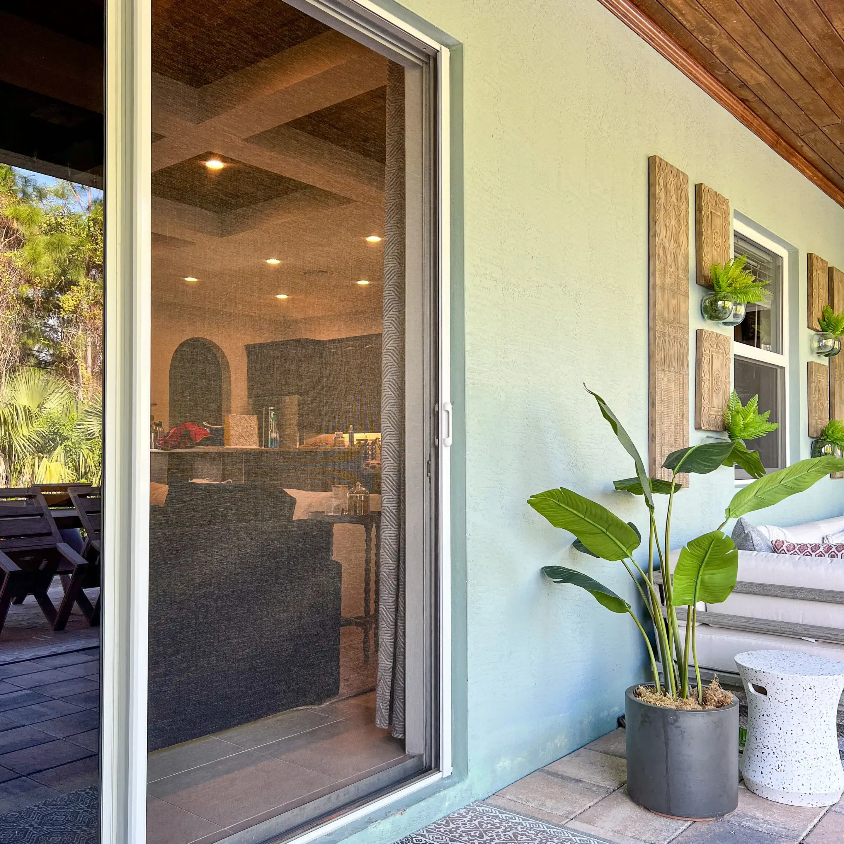 Sliding screendoor looking into kitchen