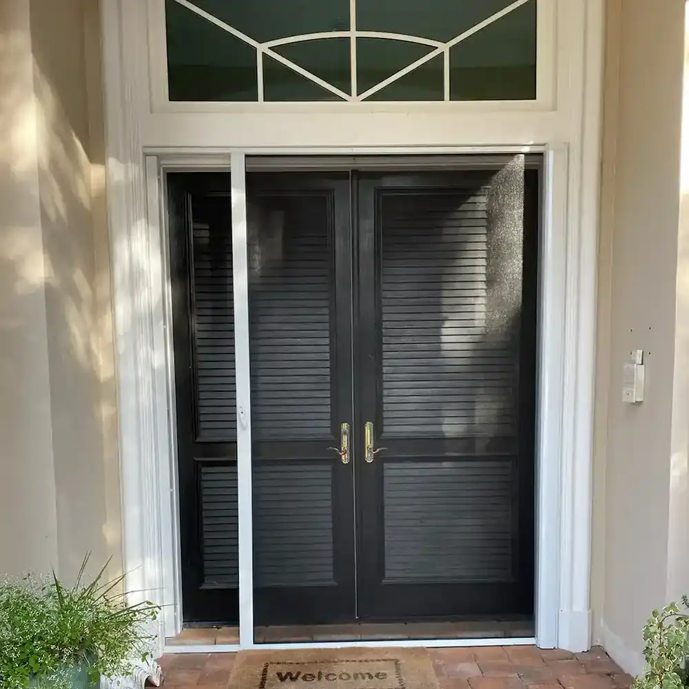 Front door with retractable screen door