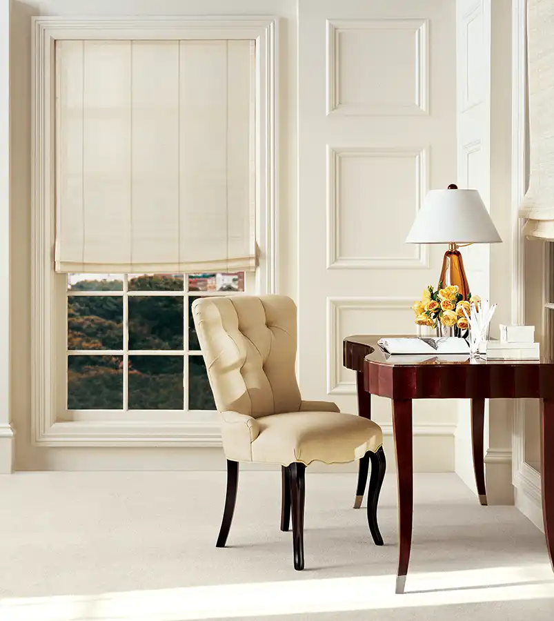 conrad-shades-handwoven-office couple looking at fabric and wood samples with designer