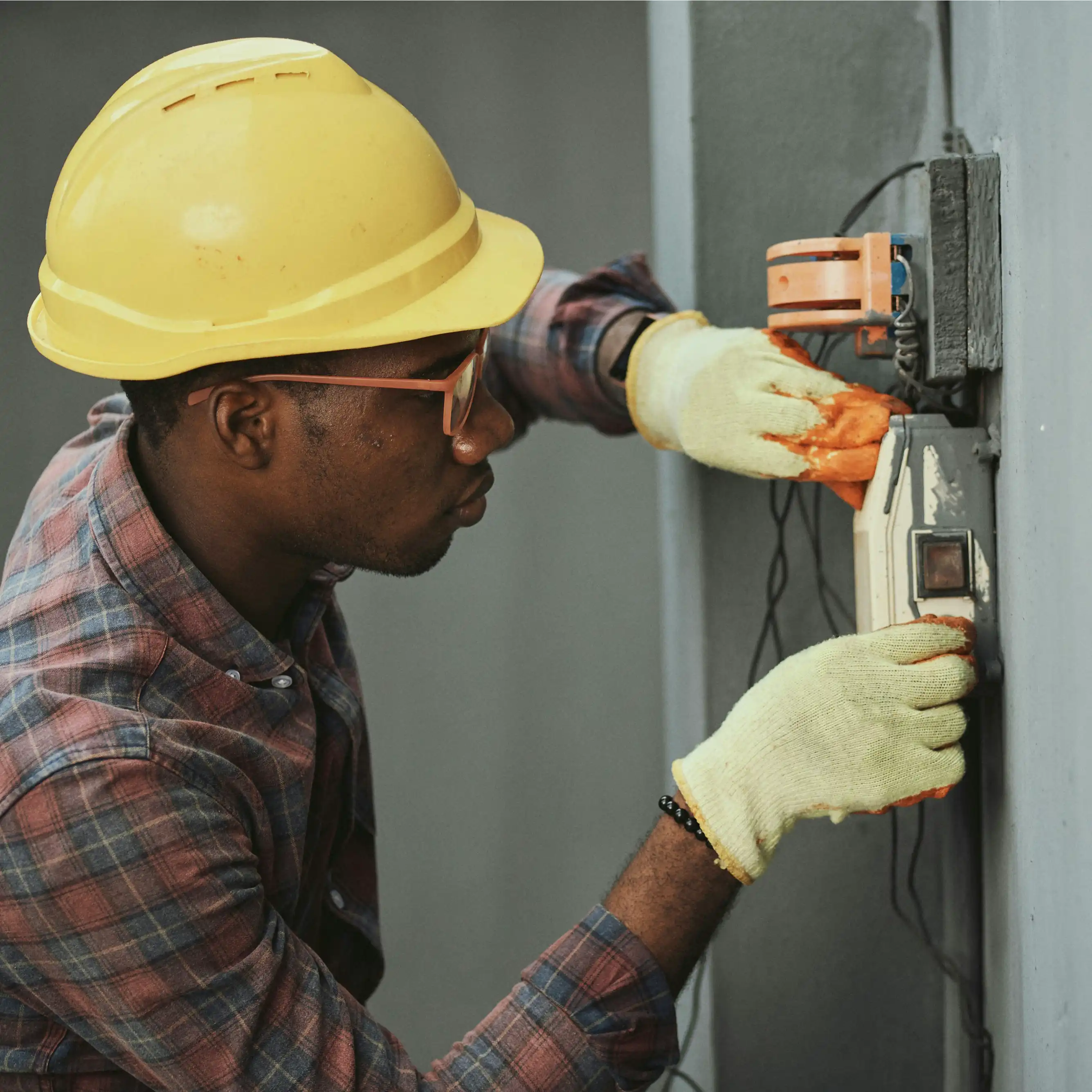 Electrician working on panel
