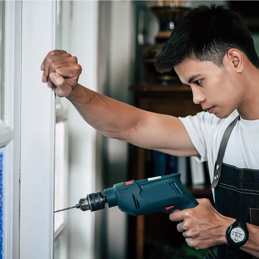 Electrician working on panel